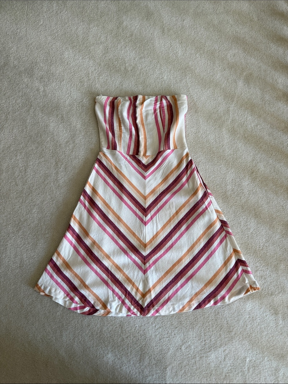Linen blend cream strapless dress with peach and pink diagonal stripes